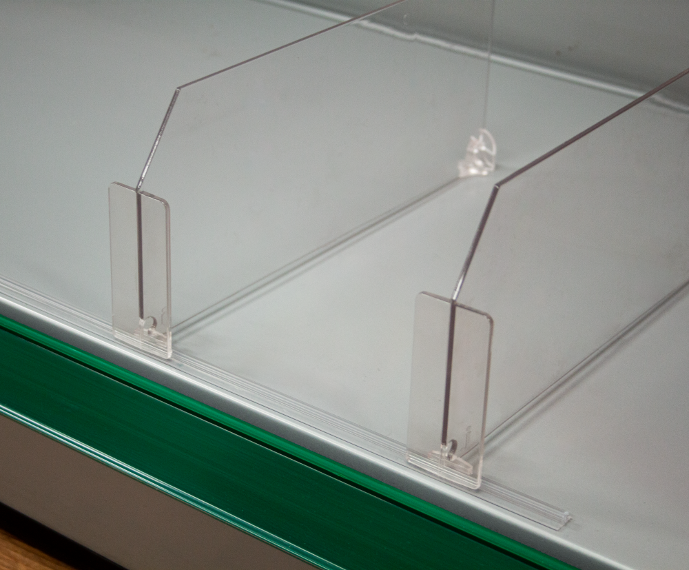 Snap On Profile without adhesive placed onto a shelf with two dividers secured onto it